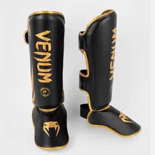 protektori za kraka venum challenger black gold протектори за крака venum challenger black/gold